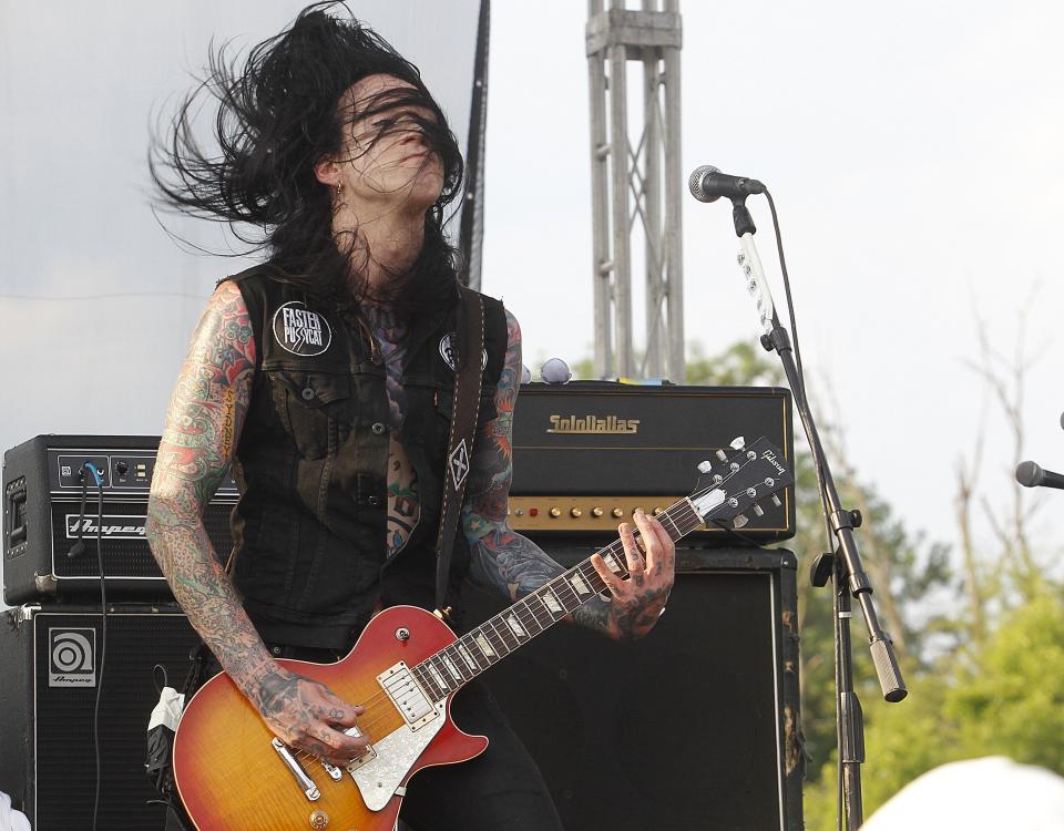 Ronnie Simmons with Faster Pussycat performs during Picktown Palooza on July 16. Chris Stein, president of the nonprofit Panger Productions that puts on the event, attributed the attendance increase to three nights of entertainment from rock bands.