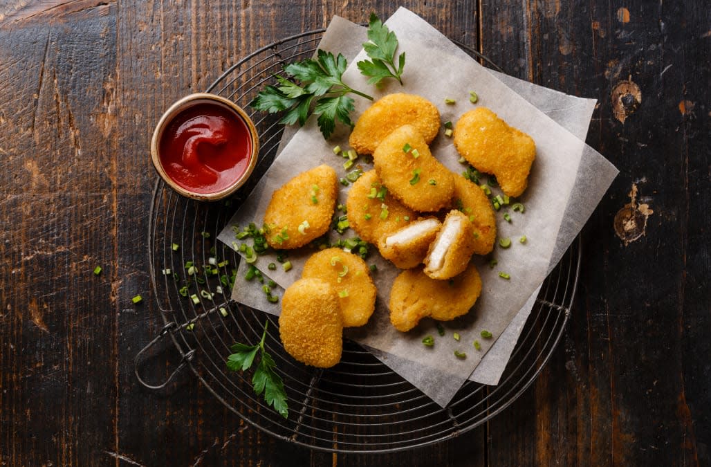 Chicken breast nuggets with tomato sauce