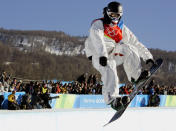 FILE - United States Shaun White makes his first run in the finals of the men's halfpipe snowboard competition at the Turin 2006 Winter Olympic Games in Bardonecchia, Italy, Feb. 12, 2006. The Beijing Olympics will be the fifth Olympics for the three-time gold medalist. And the last Olympics for the 35-year-old — get this — elder-statesman who is now more than double the age of some of the riders he goes against. (AP Photo/Mark Duncan, File)