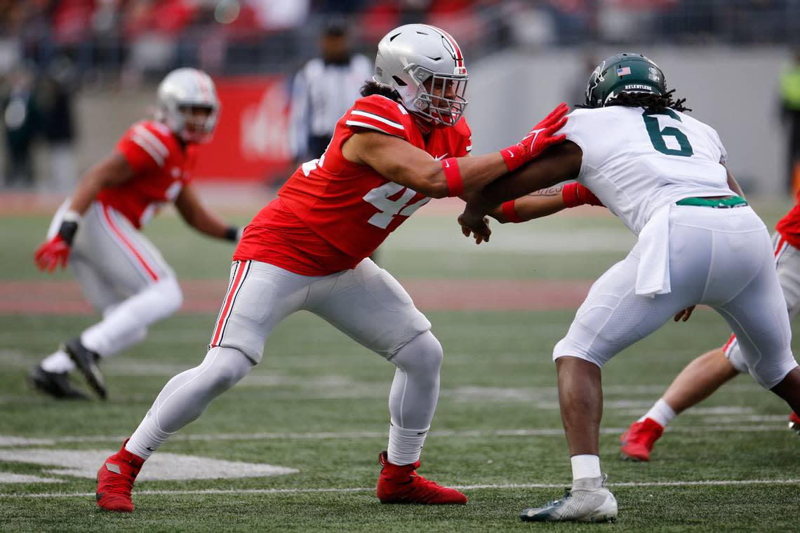 Ohio State defensive lineman J.T. Tuimoloau plays against Michigan State during an NCAA college football game Saturday, Nov. 20, 2021, in Columbus, Ohio. (AP Photo/Jay LaPrete)