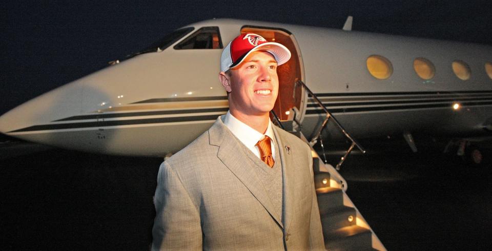 <p>Boston College quarterback Matt Ryan arrives in Arthur Blank's personal jet at the Lee Gilmer Memorial Airport in Gainesville after the Falcons picked him No. 3 in the NFL Draft. Curtis Compton / AJC</p>