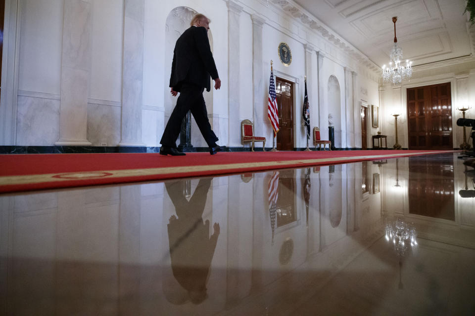 FILE - In this June 17, 2020, file photo President Donald Trump departs after speaing about the PREVENTS "President's Roadmap to Empower Veterans and End a National Tragedy of Suicide," task force, in the East Room of the White House in Washington. (AP Photo/Alex Brandon, File)