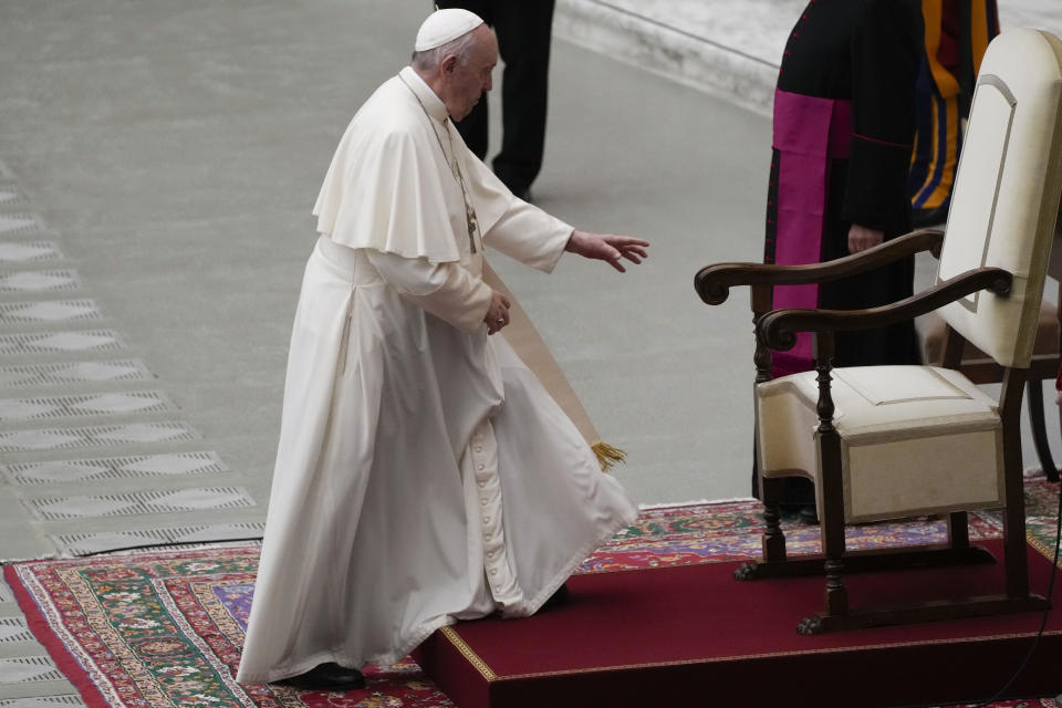 Pope Francis arrives to meet with the participants of the inter-parliamentary meeting on the COP26 in the Paul VI Hall at the Vatican, Saturday, Oct. 9, 2021. (AP Photo/Gregorio Borgia)