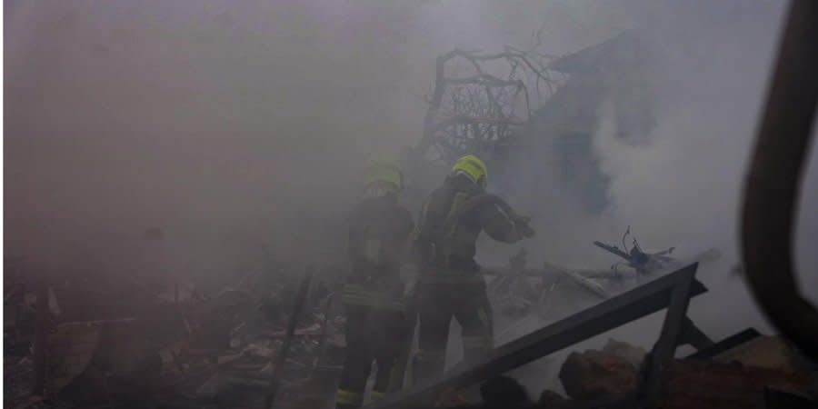 Rescuers at the site of a Russian missile attack in Odesa, March 15