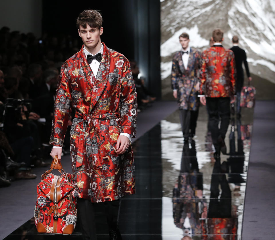 A model presents a creation by British fashion designer Kim Jones for Louis Vuitton's fall-winter 2013/2014 men's fashion collection, presented in Paris, Thursday, Jan.17, 2013. (AP Photo/Jacques Brinon)