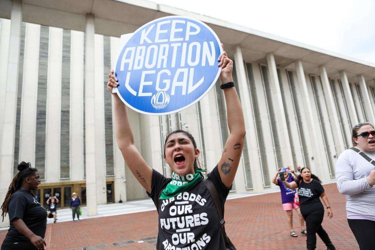 <span>Abortion rights supporters rally against a proposed six-week abortion ban in Tallahassee, Florida, on 3 April 2023.</span><span>Photograph: The Washington Post/Getty Images</span>