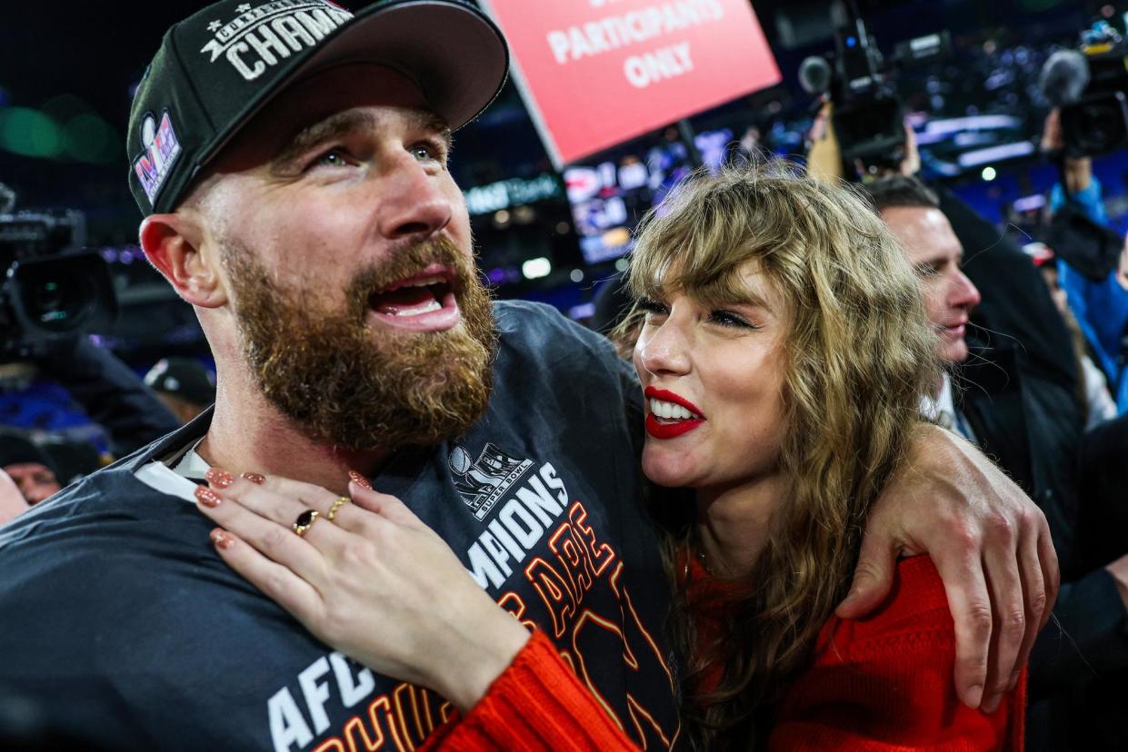 <span>Travis Kelce celebrates with Taylor Swift after the Kansas City Chiefs defeated the Baltimore Ravens on 28 January.</span><span>Photograph: Patrick Smith/Getty Images</span>