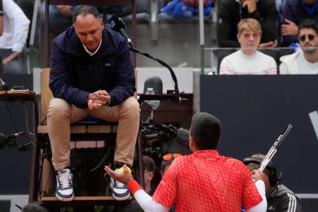 Serbia’s Novak Djokovic argues with umpire Mohamed Lahyani 