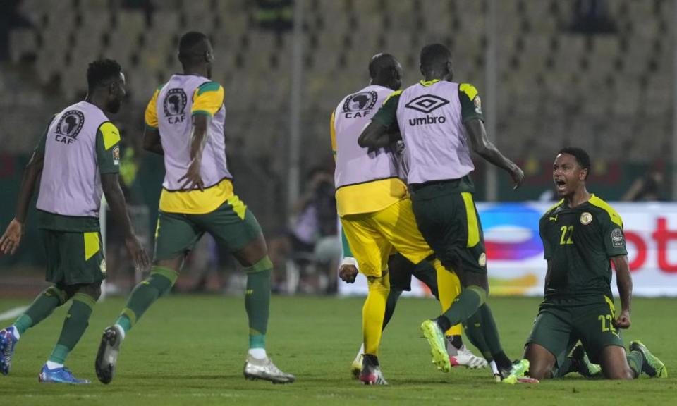 Abdou Diallo (right) celebrates after scoring the opening goal in Yaoundé.