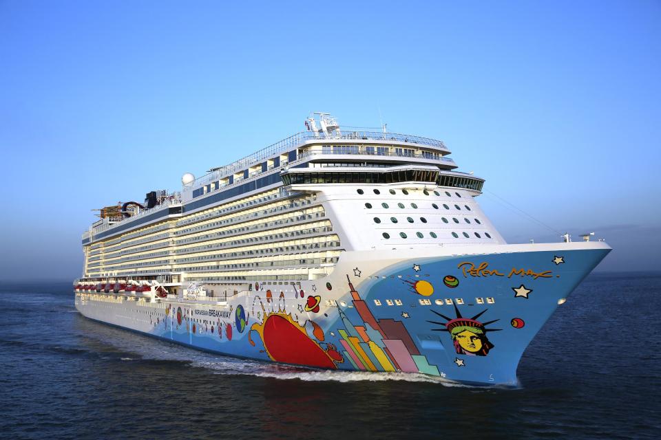 This April 29, 2013 photo provided by Norwegian Cruise Line shows the company’s new cruise ship, Norwegian Breakaway, sailing from Southampton, England, to New York. The ship arrived Tuesday, May 7, and is scheduled to be christened Wednesday, May 8. The art on the exterior hull showing a New York City skyline and Statue of Liberty was designed by artist Peter Max. The ship will homeport from New York. (AP Photo/Norwegian Cruise Line)