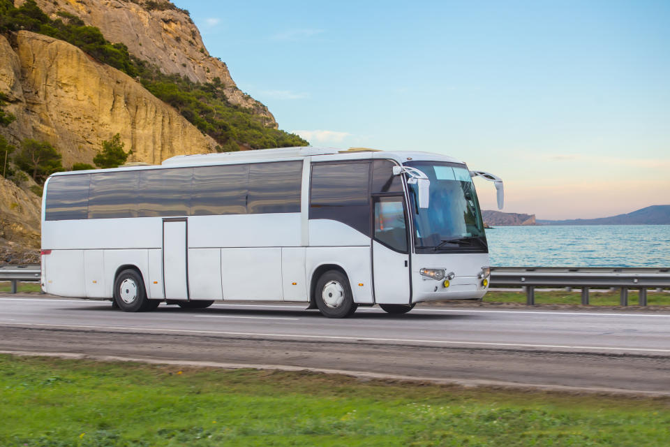 a bus driving along a highway