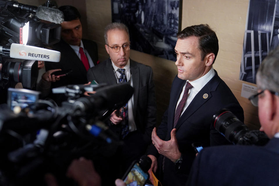 Republican U.S. Rep. Mike Gallagher (R-WI) speaks to reporters after a Republican caucus meeting on the first day of the new Congress at the U.S. Capitol in Washington, U.S., January 3, 2023. REUTERS/Nathan Howard