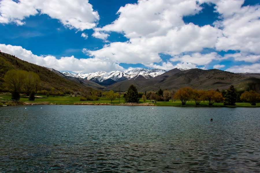 A view of the snow-capped mountains as seen from Utah Lake near Provo