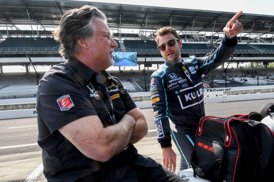 Andretti Herta Autosport with Marco Andretti and Curb-Agajanian driver Marco Andretti (98) talks with Michael Andretti on Wednesday, May 17, 2023, during the second day of practice for the Indianapolis 500 at Indianapolis Motor Speedway. 