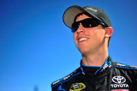 TALLADEGA, AL - OCTOBER 22: Denny Hamlin, driver of the #11 FedEx Office Toyota, looks on during qualifying for the NASCAR Sprint Cup Series Good Sam Club 500 at Talladega Superspeedway on October 22, 2011 in Talladega, Alabama. (Photo by Jason Smith/Getty Images)