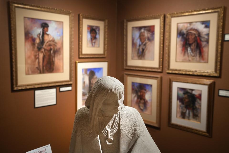 Paintings, sculptures, pottery, kachina dolls, jewelry, and baskets of the American West fill the walls of the Eddie Basha Collection gallery in Chandler, Ariz., on Oct. 5, 2023. The final day of viewing for the public will be Nov. 30, 2023, before the collection is moved to the Heard Museum and Scottsdale's Museum of the West.