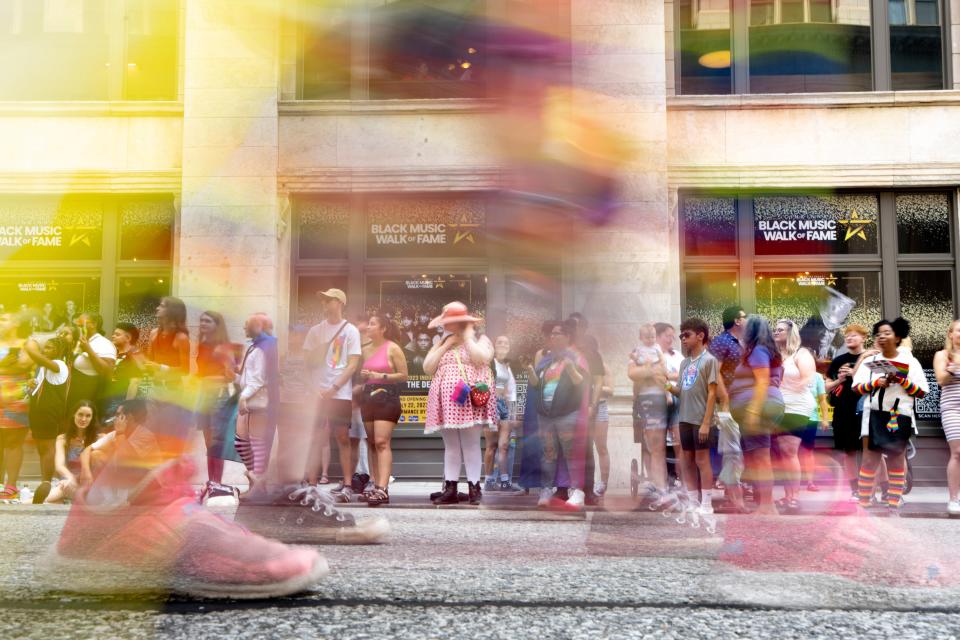 People look on during the Cincinnati Pride Parade in downtown Cincinnati on Saturday, June 24, 2023.