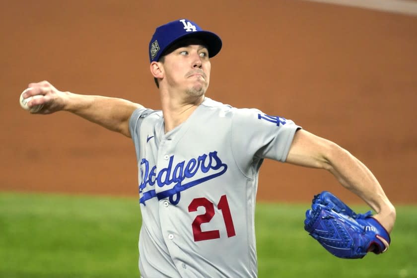 FILE - In this Oct. 23, 2020 file photo, Los Angeles Dodgers starting pitcher Walker Buehler throws agains.