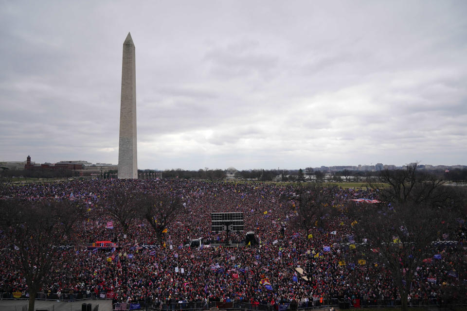 TOPSHOT - Crowds of people gather as US President Donald Trump speaks to supporters from The Ellipse near the White House on January 6, 2021, in Washington, DC. - Thousands of Trump supporters, fueled by his spurious claims of voter fraud, are flooding the nation's capital protesting the expected certification of Joe Biden's White House victory by the US Congress. (Photo by MANDEL NGAN / AFP) (Photo by MANDEL NGAN/AFP via Getty Images)