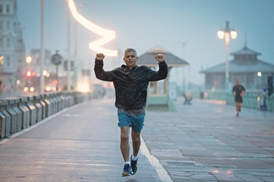 Sadiq Khan pictured running along the seafront in Brighton where Labour Party is holding its conference (PA)