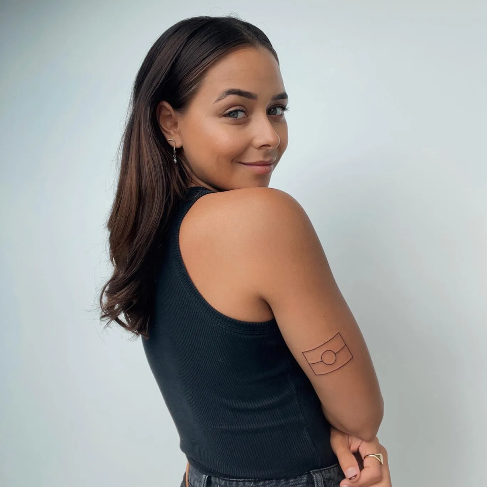 Brooke Blurton showing off her Aboriginal flag tattoo.