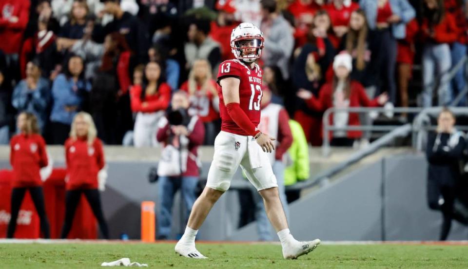 N.C. State quarterback Devin Leary (13) walks off the field after the Wolfpack didn’t make a first down during the first half of N.C. State’s game against Florida State at Carter-Finley Stadium in Raleigh, N.C., Saturday, Oct. 8, 2022.