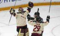 Montreal goalie Ann-Renee Desbiens celebrates with teammates Kati Tabin and forward Marie-Philip Poulin following a PWHL hockey game against Ottawa, Saturday, April 27, 2024 in Ottawa, Ontario. (Adrian Wyld/The Canadian Press via AP)