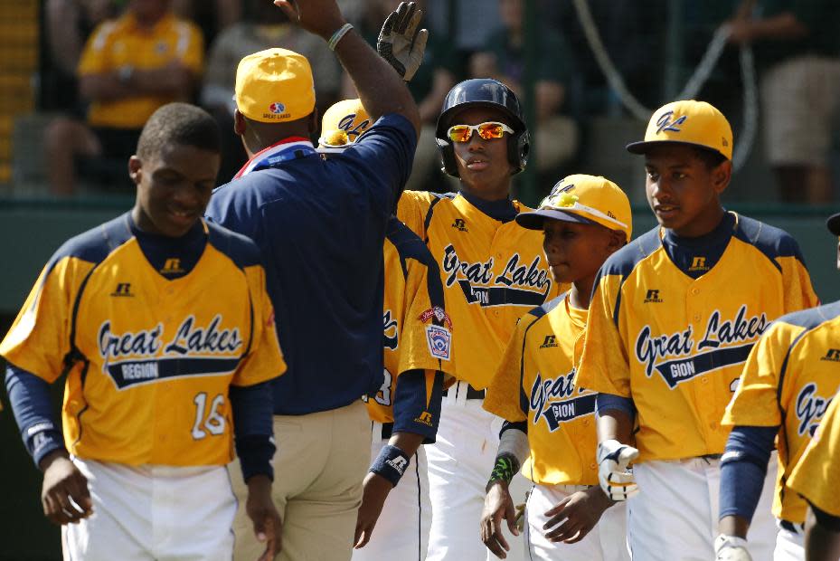 The Jackie Robinson West Little League team advanced to the U.S. finals with a win Thursday. (AP)