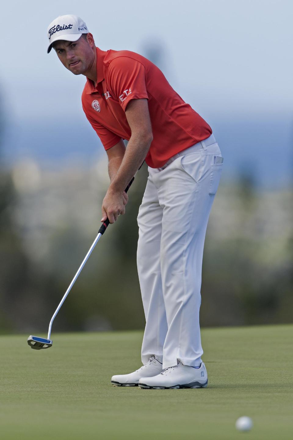 Webb Simpson follows his putt on the 10th green during the second round of the Tournament of Champions golf tournament, Saturday, Jan. 4, 2014, in Kapalua, Hawaii. (AP Photo/Marco Garcia)