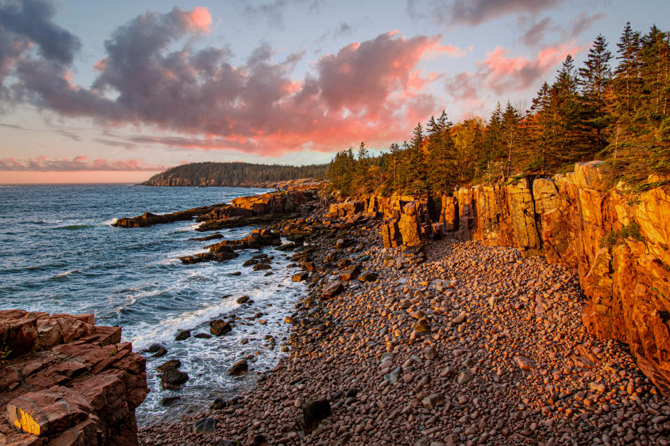 The Ocean Path Trail meanders along vast slabs of pink granite, picturesque cliffs, and breathtaking oceans views of the striking coast of Maine. The Ocean Path is a great way to access Thunder Hole and Otter Point from Sand Beach on a gradual hike. This picturesque hike is a great way to experience  Acadia National Park.