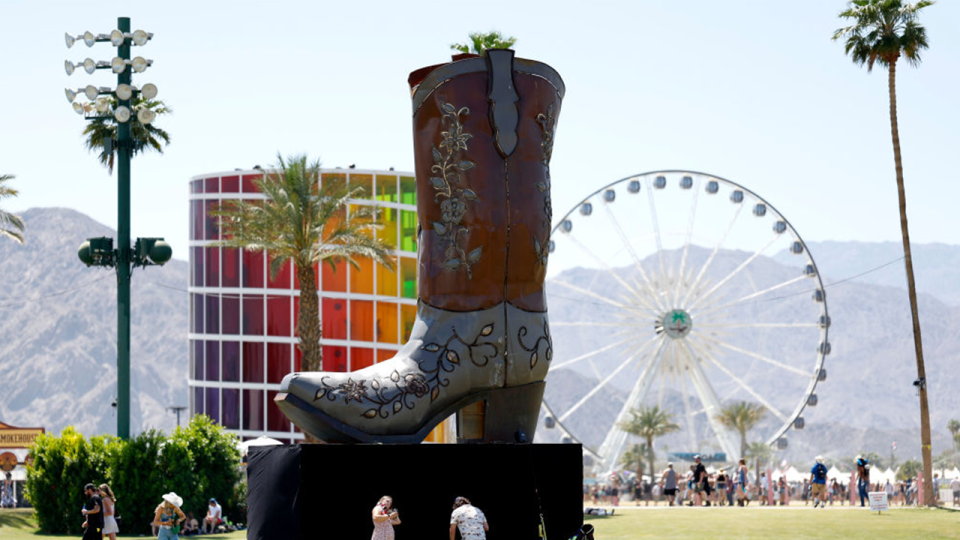 Spectra, a boot statue, and the Ferris Wheel are seen during Day 1 of the 2023 Stagecoach Festival on April 28, 2023 in Indio, California.