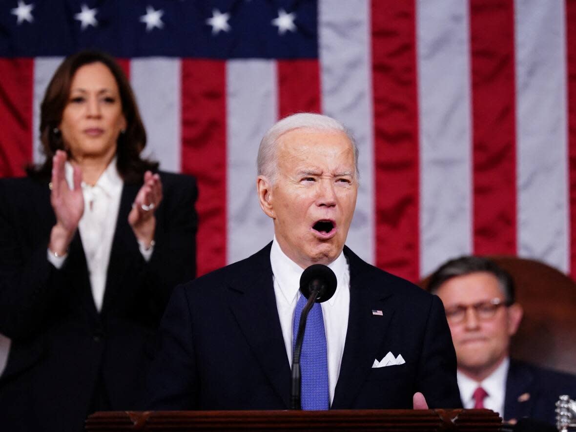U.S. President Joe Biden delivered a fiery campaign-style speech that had Democrats like Vice-President Kamala Harris cheering, and Republicans like Speaker Mike Johnson sitting stone-faced. (Shawn Thew/Reuters - image credit)