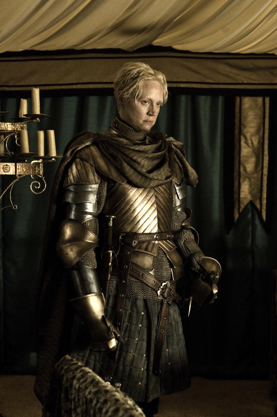 There are a few <em>Game of Thrones</em> actors who've changed hardly at all over the years, and it's fitting that <strong>Gwendoline Christie</strong> should be one of them. Her character Brienne of Tarth is built on steadfastness and loyalty, so it's hardly strange that her costuming and makeup have remained consistent. In this Season 2 appearance, her armor is a bit more ostentatious than it would appear later, which makes sense, given that she was guarding a member of the royal family, but her hair and makeup remain largely unchanged, <a href="https://www.allure.com/story/gwendoline-christie-height?mbid=synd_yahoo_rss" rel="nofollow noopener" target="_blank" data-ylk="slk:just like Brienne's spirit;elm:context_link;itc:0;sec:content-canvas" class="link ">just like Brienne's spirit</a>.