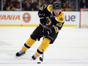 BOSTON, MA - MARCH 29: Brad Marchand #63 of the Boston Bruins takes the puck in the first period against the Washington Capitals on March 29, 2012 at TD Garden in Boston, Massachusetts. (Photo by Elsa/Getty Images)