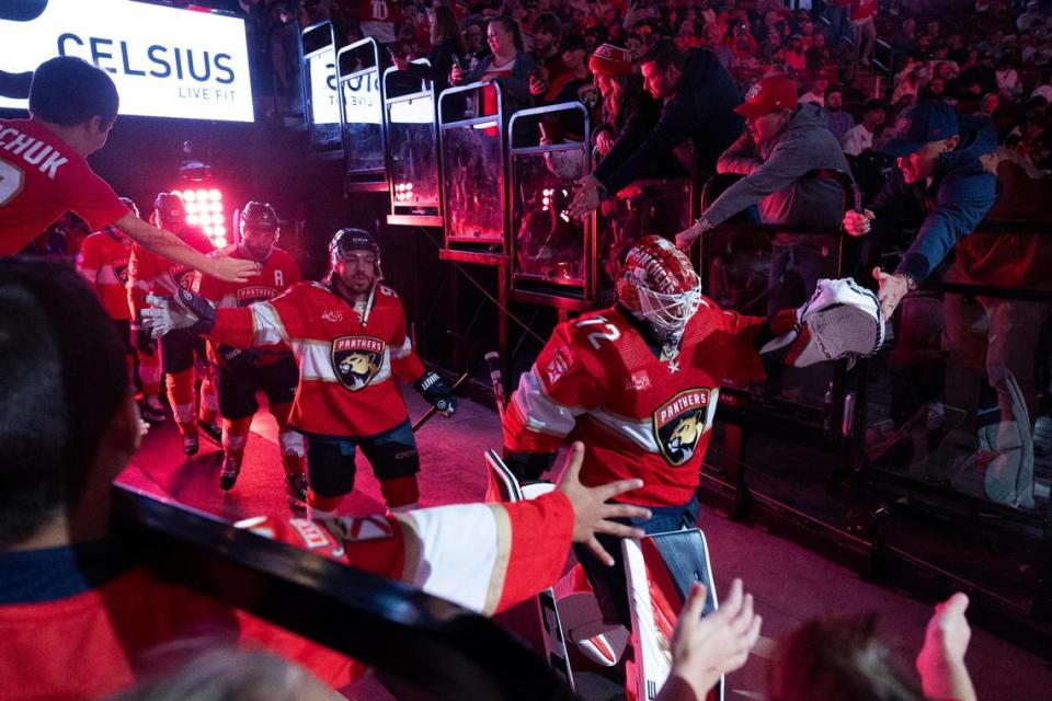 Florida Panthers goaltender Sergei Bobrovsky (72) high fives fans while walking onto the ice before the first period of a hockey game against the Detroit Red Wings on Wednesday, Jan. 17, 2024, at Amerant Bank Arena in Sunrise, Fla.