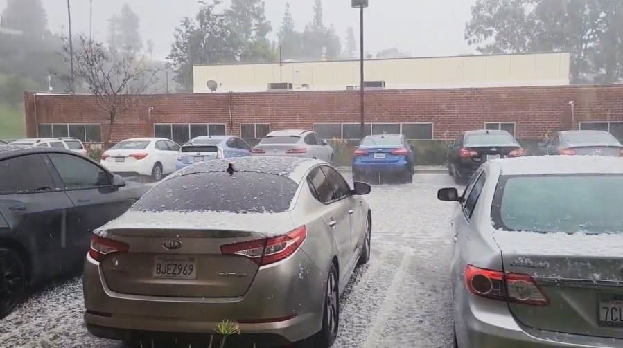 Large pieces of hail rained down on parked vehicles in Porter Ranch during a thunderstorm on March 7, 2024. (@shayera)
