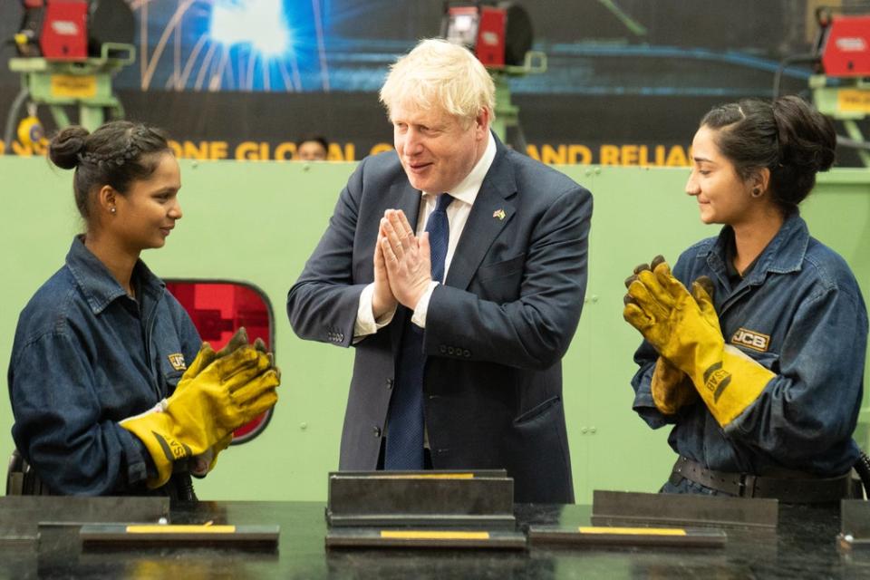 Prime Minister Boris Johnson speaks to workers at the new JCB factory in Vadodara, Gujarat (Stefan Rousseau/PA) (PA Wire)