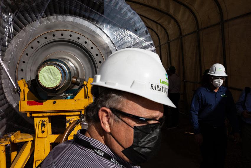 Luminant staff and media walk past a combustion turbine rotor at Vistra Corp.’s Midlothian power plant. The company has asked the state's Railroad Commission to stop a major pipeline company from cutting off fuel to five Vistra power plants over a financial dispute.