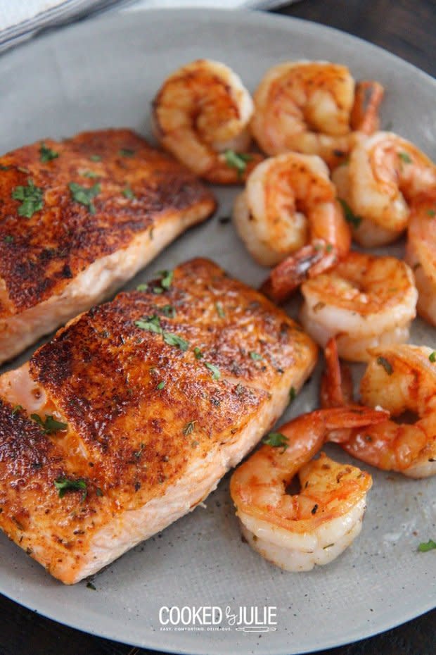 <p><a href="https://www.cookedbyjulie.com/cajun-salmon-and-shrimp/" rel="nofollow noopener" target="_blank" data-ylk="slk:Cooked by Julie;elm:context_link;itc:0;sec:content-canvas" class="link ">Cooked by Julie</a></p><p>This Cajun salmon and shrimp is the ultimate weeknight meal! Tender and flaky salmon topped off with juicy shrimp and creamy Cajun sauce.</p><p><strong>Get the recipe: <a href="https://www.cookedbyjulie.com/cajun-salmon-and-shrimp/" rel="nofollow noopener" target="_blank" data-ylk="slk:Cajun Salmon and Shrimp;elm:context_link;itc:0;sec:content-canvas" class="link ">Cajun Salmon and Shrimp</a></strong></p><p><strong>Related: <a href="https://parade.com/992211/kristamarshall/best-cajun-recipes/" rel="nofollow noopener" target="_blank" data-ylk="slk:45 Best Cajun Recipes;elm:context_link;itc:0;sec:content-canvas" class="link ">45 Best Cajun Recipes</a></strong></p>