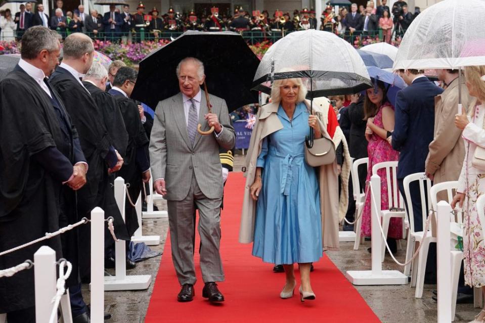 King Charles and Queen Camilla were rushed out of a royal engagement on Monday following a security scare. POOL/AFP via Getty Images