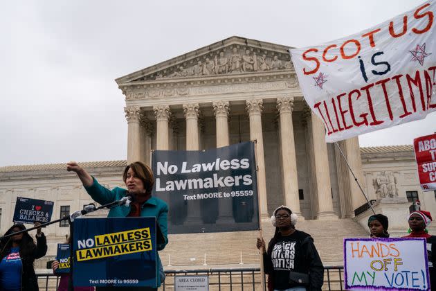 Sen. Amy Klobuchar (D-Minn.) speaks during a rally out in front of the Supreme Court of the United States during arguments in the Moore v. Harper case.