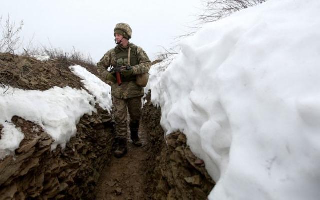 A Ukrainian serviceman on the frontline with Russia-backed separatists in the Donetsk region - AFP