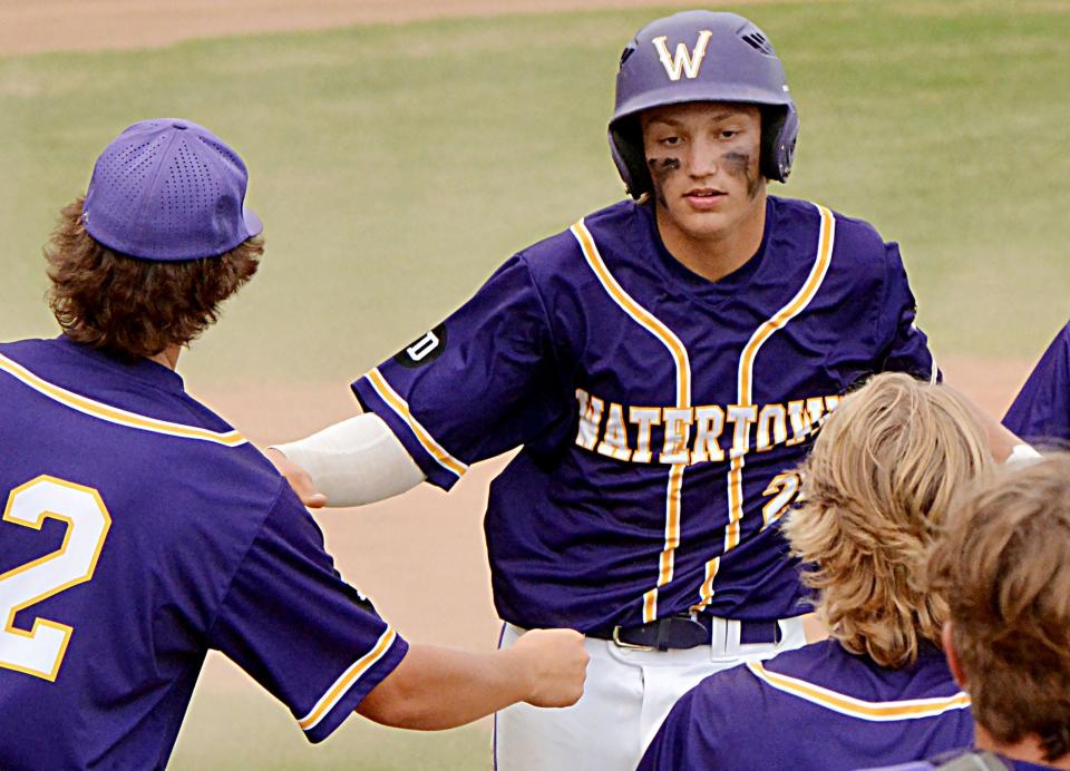 Spencer Wientjes (center) and the Watertown Post 17 Junior Legion baseball team punched its ticket to the state Class A tournament by beating Yankton 6-5 on Friday and 13-0 on Saturday in a best-of-three playoff series at Watertown Stadium. Watertown (33-13) plays in the state tournament Thursday through Saturday at Sioux Falls.