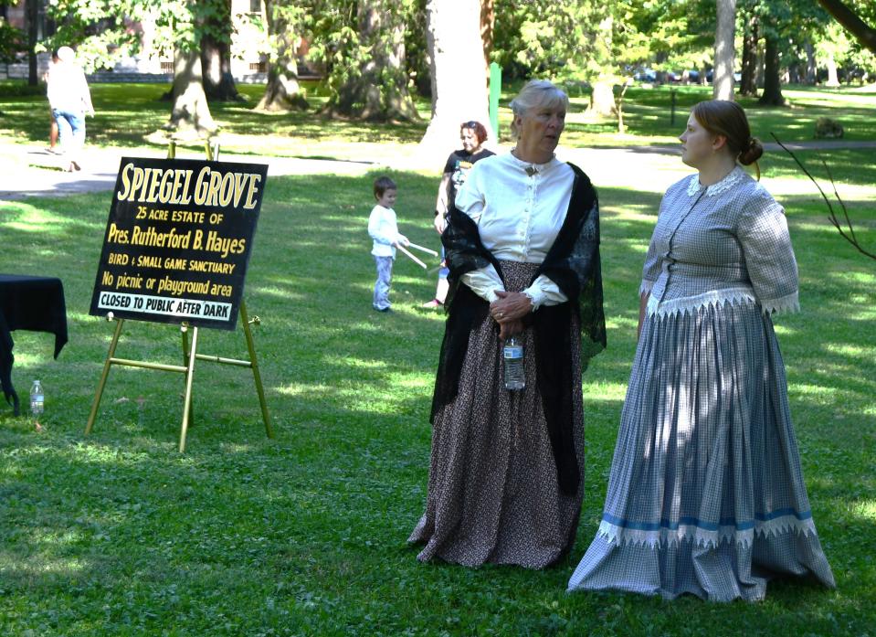 Cathey Harpster and Kathryn Fyfe portray Sophia Birchard Hayes and Fanny Arabella Hayes at the reverse parade.