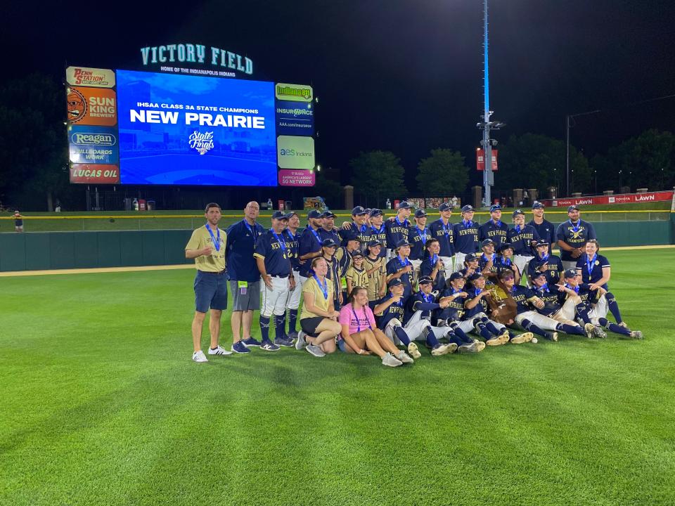 The New Prairie baseball team takes a photo after winning the IHSAA Class 3A state championship game Friday, June 14, 2024, at Victory Field in Indianapolis.