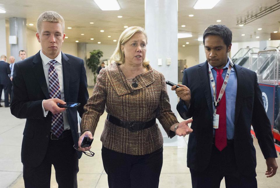 Senator Mary Landrieu (D-LA) speaks to reporters after the Democratic weekly policy luncheon on Capitol Hill in Washington January 28, 2014. REUTERS/Joshua Roberts (UNITED STATES - Tags: POLITICS)