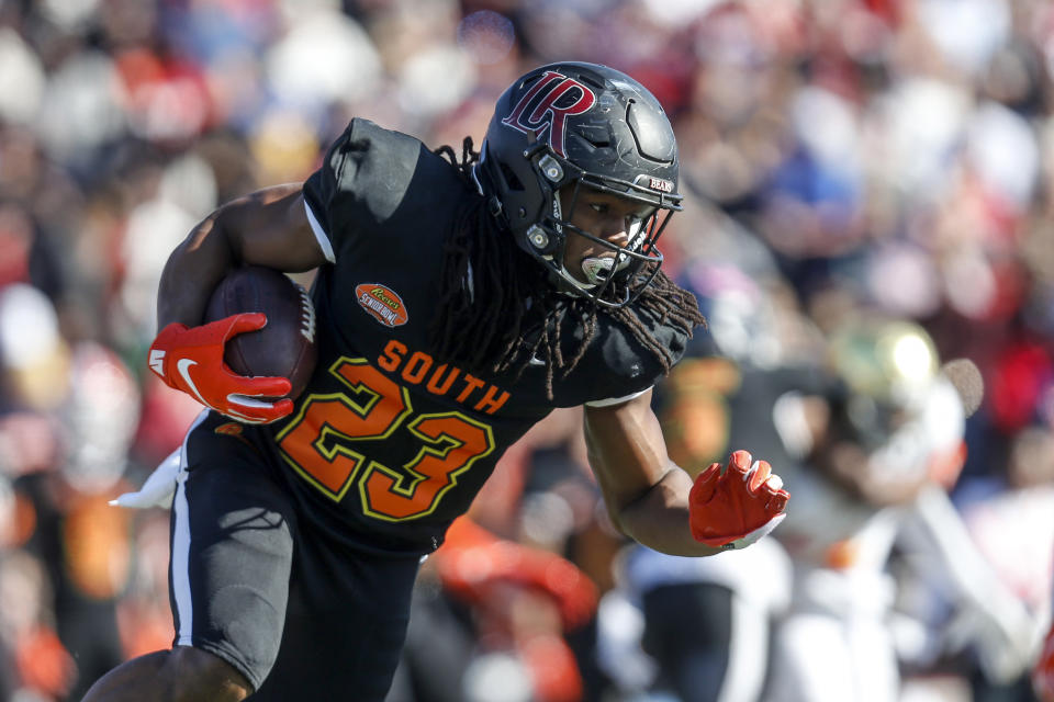 South safety Kyle Dugger of Lenoir Rhyne (23) carries the ball on a punt return during the first half of the Senior Bowl college football game Saturday, Jan. 25, 2020, in Mobile, Ala. (AP Photo/Butch Dill)