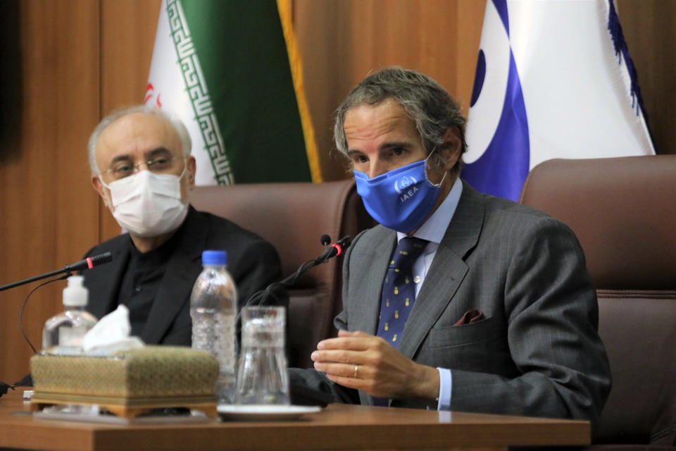 Director General of International Atomic Energy Agency, IAEA, Rafael Mariano Grossi, right, speaks at a press briefing with the head of the Atomic Energy Organization of Iran Ali Akbar Salehi, in Tehran, Iran, Tuesday, Aug. 25, 2020. (Atomic Energy Organization of Iran via AP)