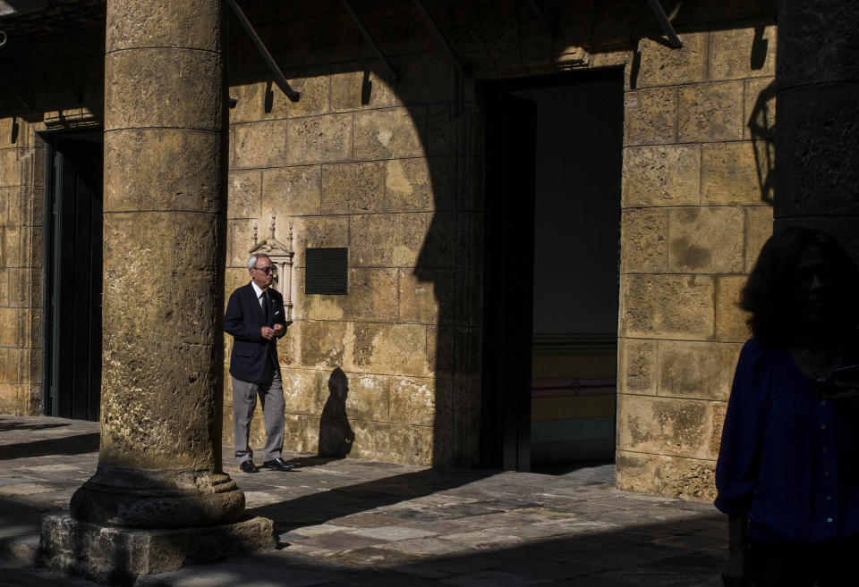 FILE - In this Nov. 23, 2018 file photo, Havana City Historian Eusebio Leal Spengler walks in the courtyard of the City Museum in Havana, Cuba. Leal, who oversaw the transformation of crumbling Old Havana to an immaculately restored colonial tourist attraction, becoming the de-facto mayor of the historic city center and one of the nation’s most prominent public intellectuals, has died according to state media on Friday, July 31, 2020, after a long battle with cancer. (AP Photo/Desmond Boylan, File)