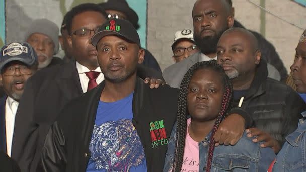 PHOTO: Community members gather for a prayer vigil on Nov. 2 in Chicago after 14 people were injured in a drive-by shooting on Halloween. One of the shooting victims is joined Black Men United's Terry Young. (WLS)
